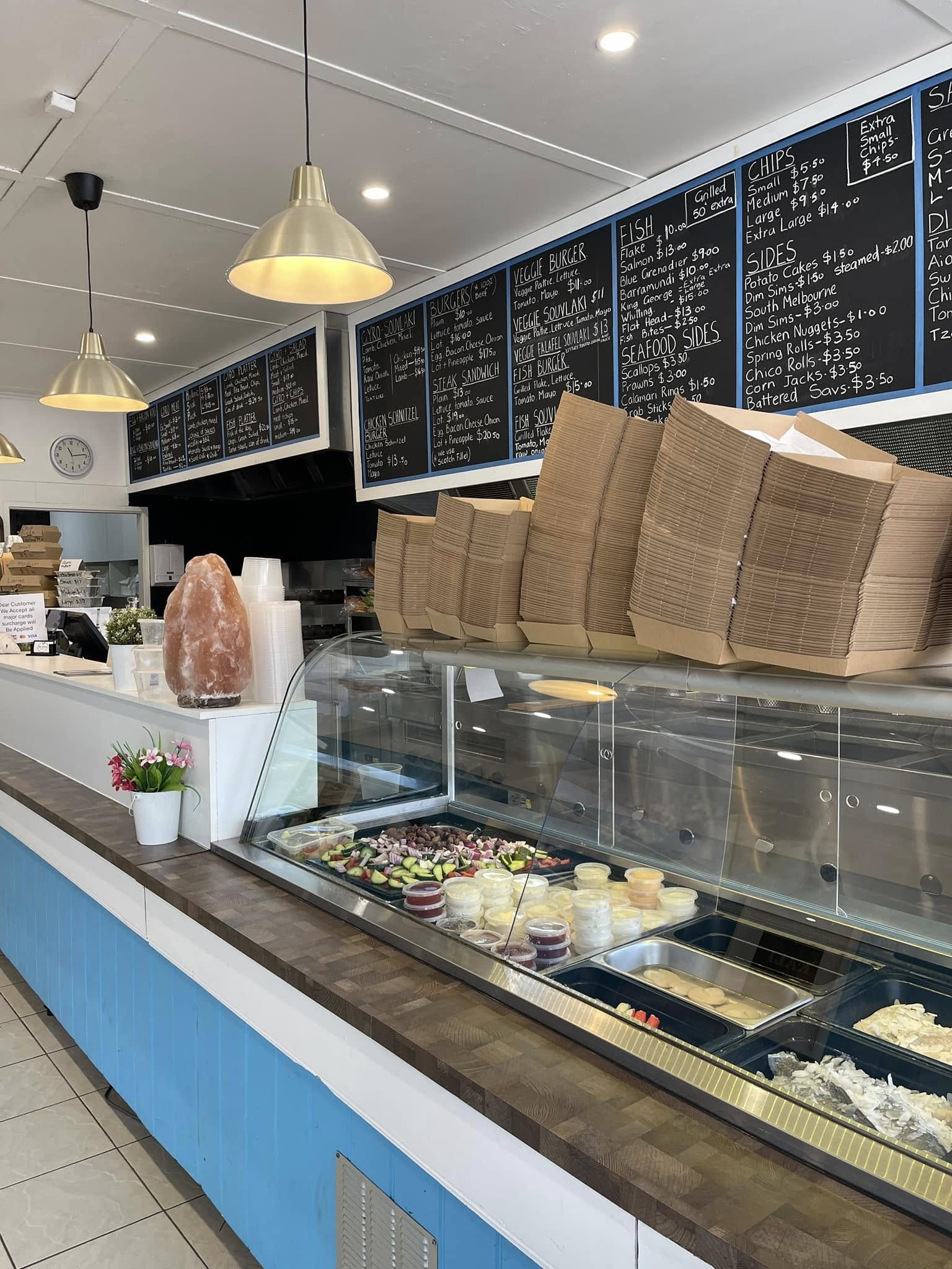 The counter and menu boards at Mr Beau